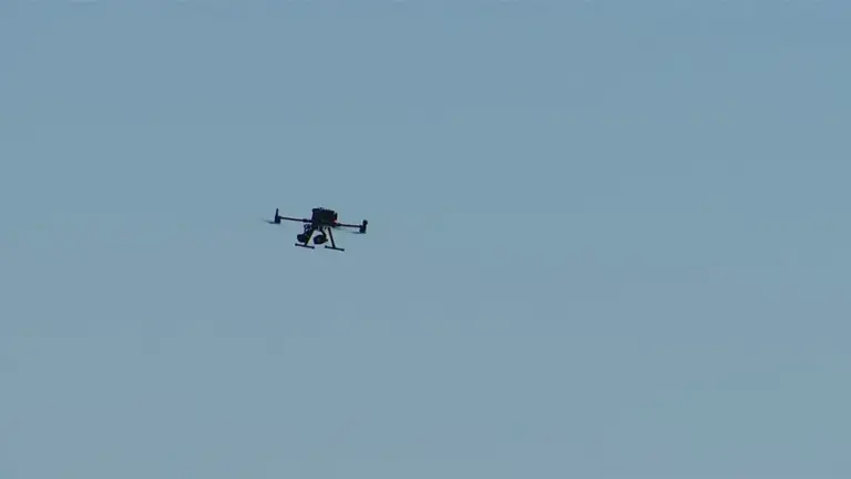 Aerial drone against a blue sky
