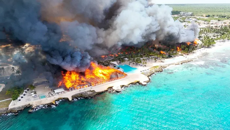 Aerial view of flames consume resort
