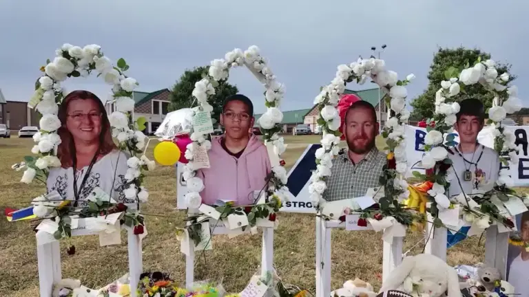 A memorial for Cristina Irimie, Mason Schermerhorn, Richard Aspinwall and Christian Angulo in front of Apalachee High School in Winder.