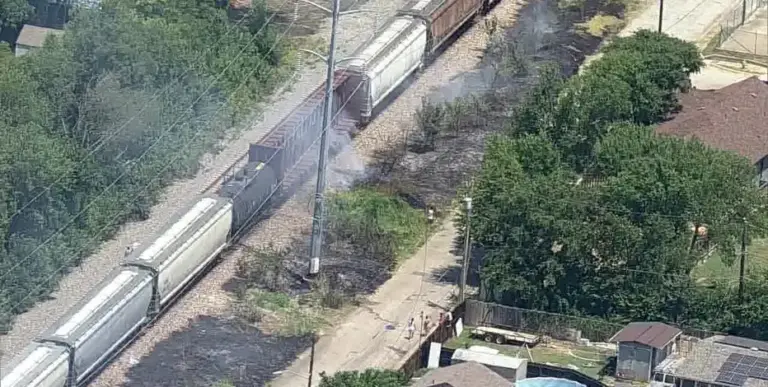 Fire burns along train tracks in Fort Worth