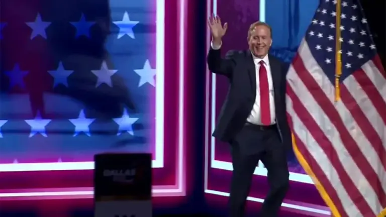Ken Paxton waves to the crowd at the Republican midterm convention in Dallas on Sept. 9, 2026.